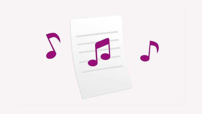 Noten, die über einem Blatt Papier schweben